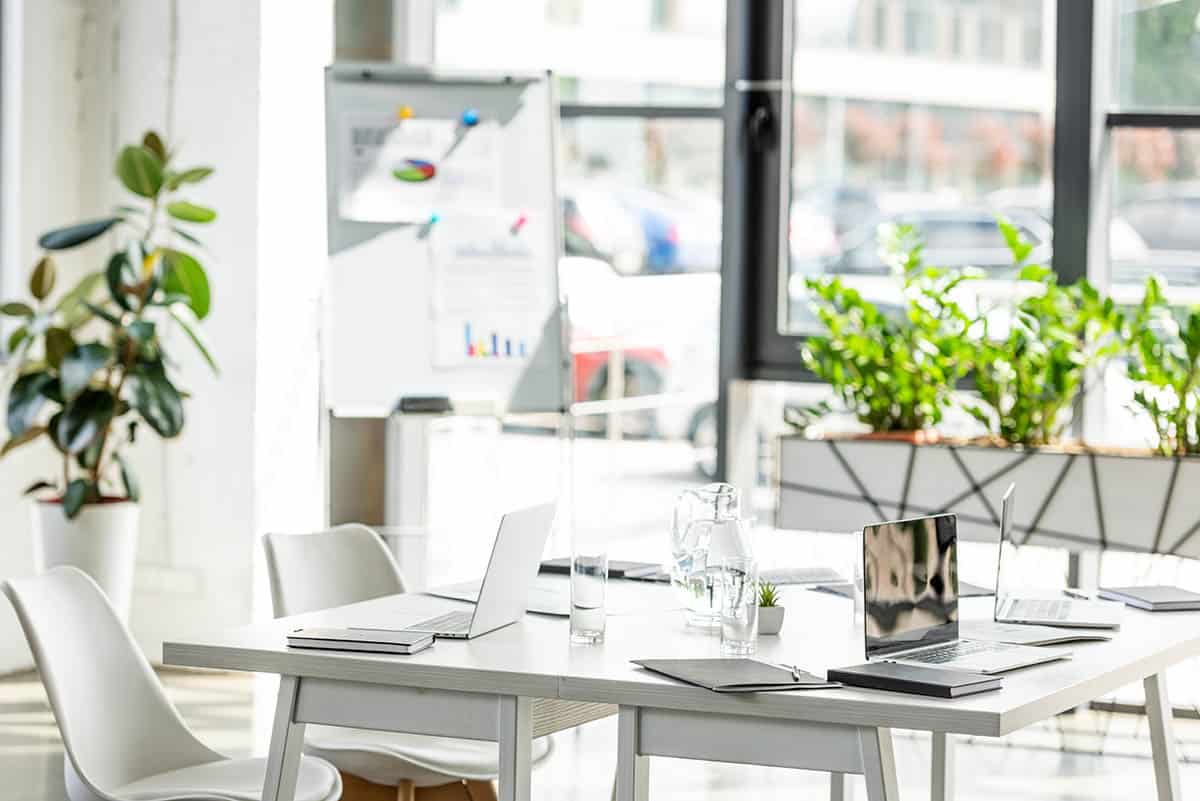 office-with-table-chairs-green-plants-and-digita-2023-11-27-05-17-32-utc-copy.jpg